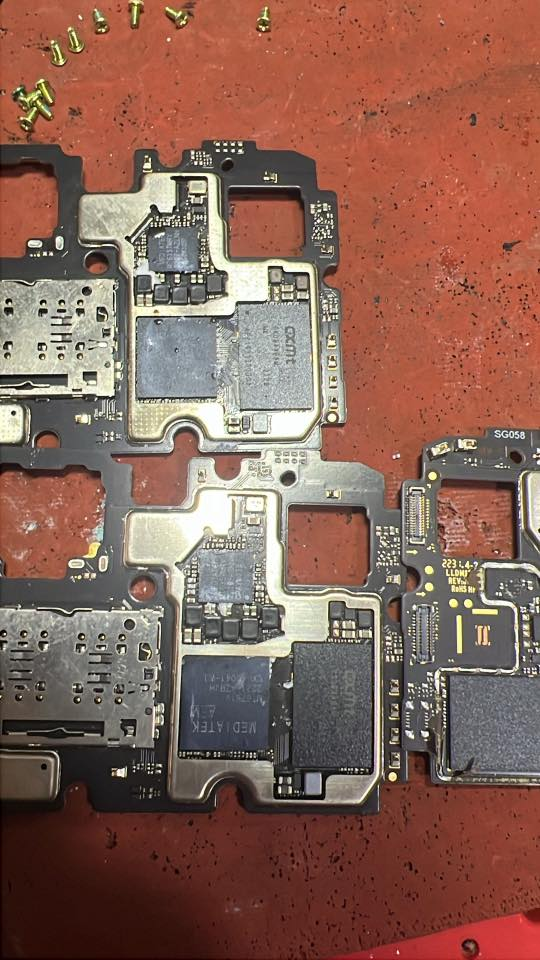Close-up of rejected motherboard showing MediaTek MT6761V and CXMT chips